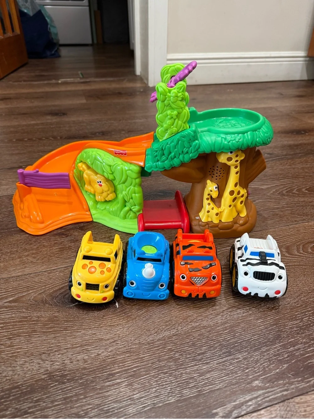 Fisher-Price Bright Green & Orange Jungle Slide Playset with Colorful Toy Cars